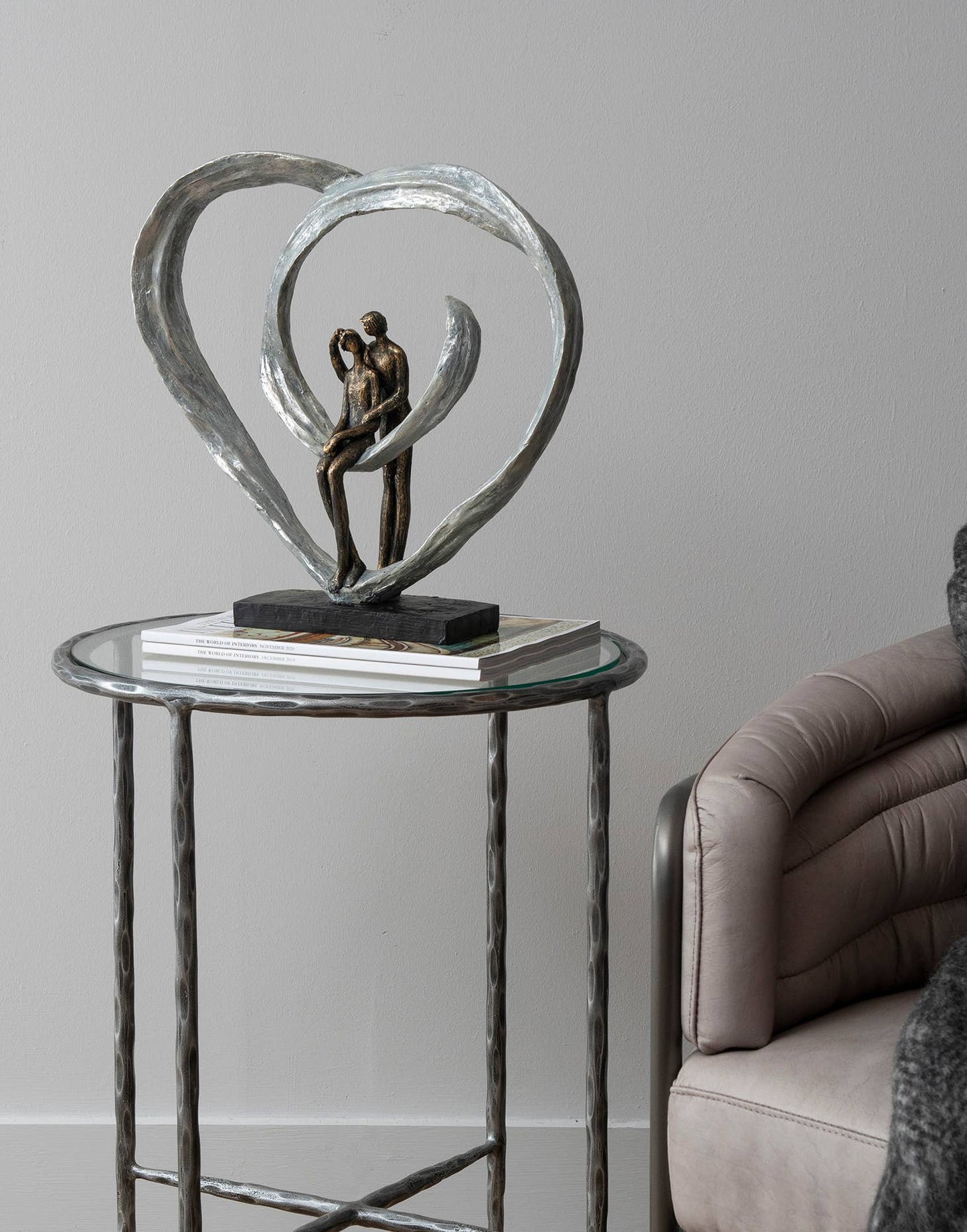 Love Sculpture In Circular Heart: Bronze / 40%polyresin, 60%limestone