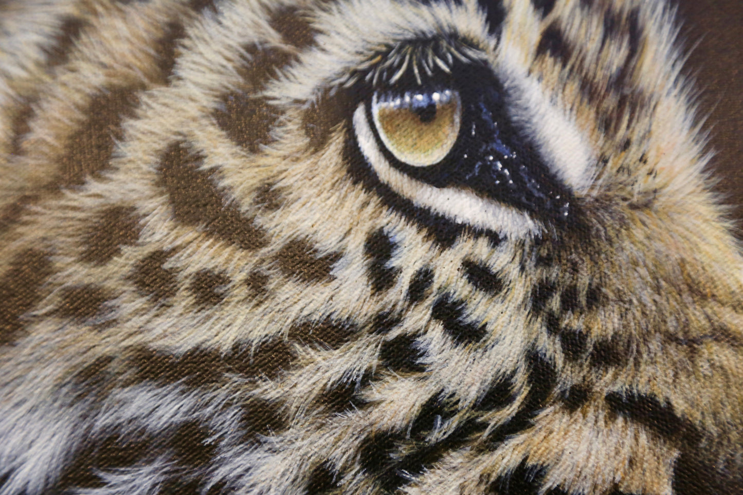 Leapard by Dean Walker - The leopard's fur is beautifully detailed, showcasing a variety of brown and black spots against a golden background