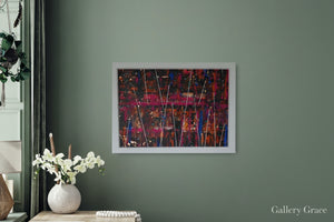 Modern interior with abstract art on a green wall, table with vase and books, and chair.