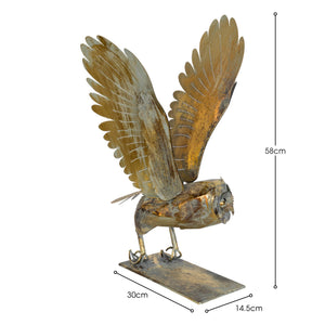Metal owl sculpture with open wings, shown with dimensions on a white background